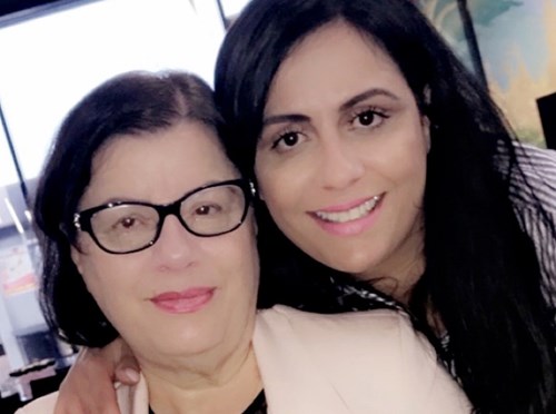 Abi pictured with her mum Afaf.