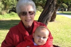 Krystyna's mum Irena, sitting with her granddaughter on her lap. 