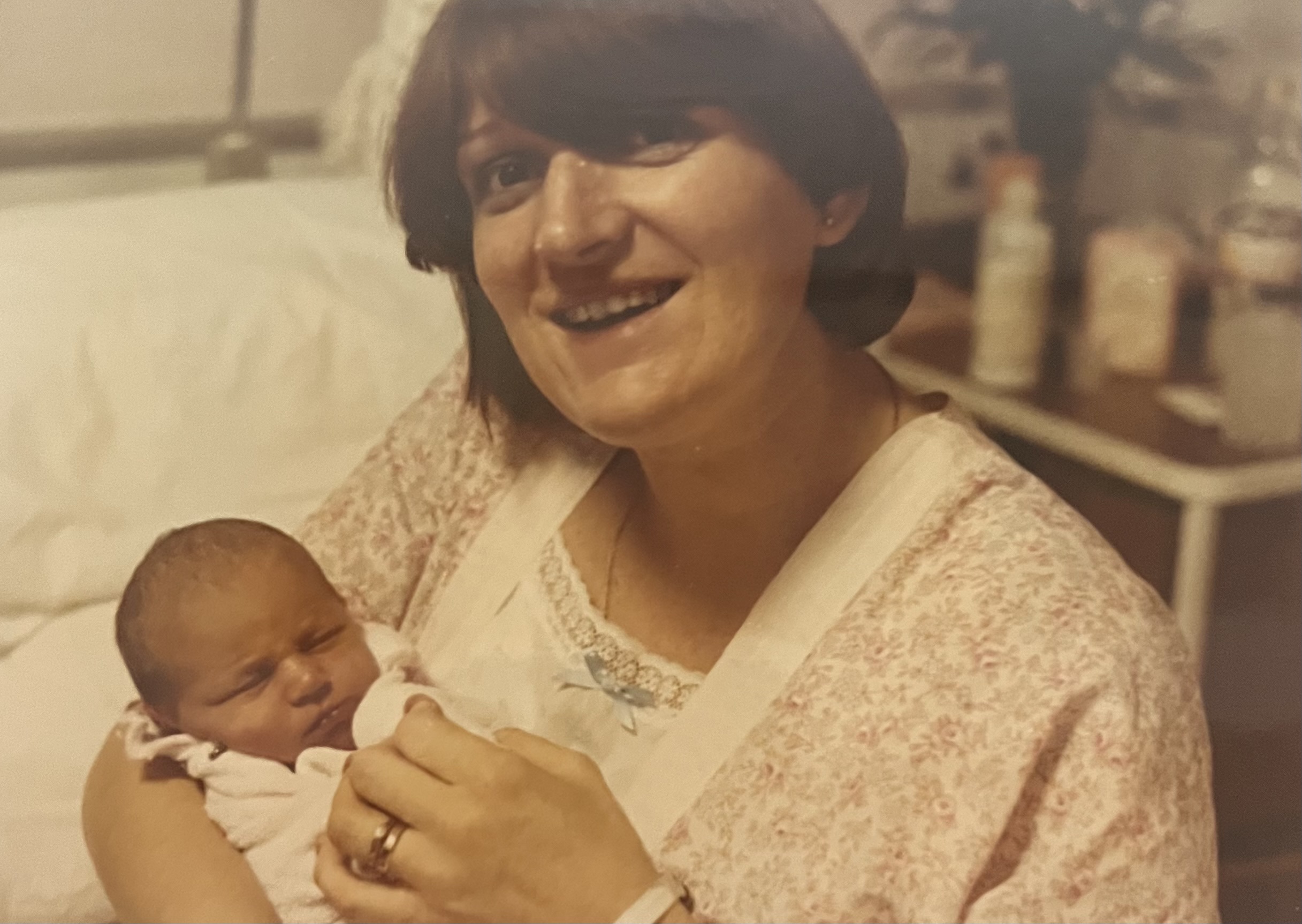 Stephanie holding her baby daughter Sara. 