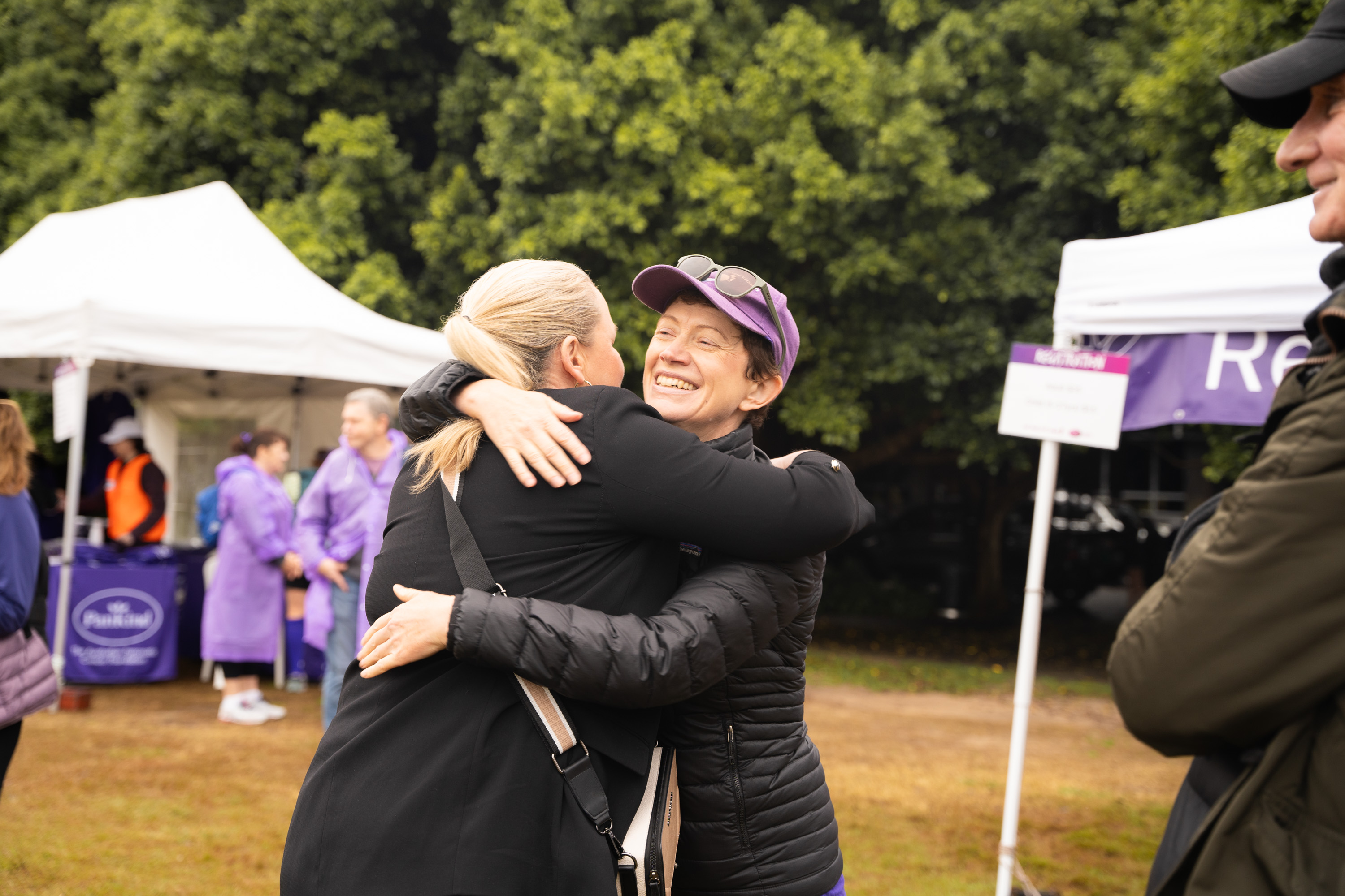 Pancreatic cancer founder Carolin Kelly hugging CEO Michelle Stewart